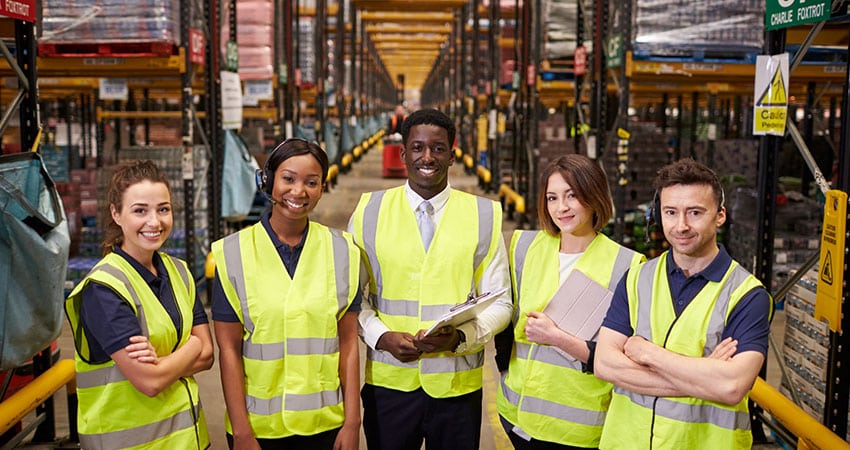 warehouse-workers-in-a-row-feature